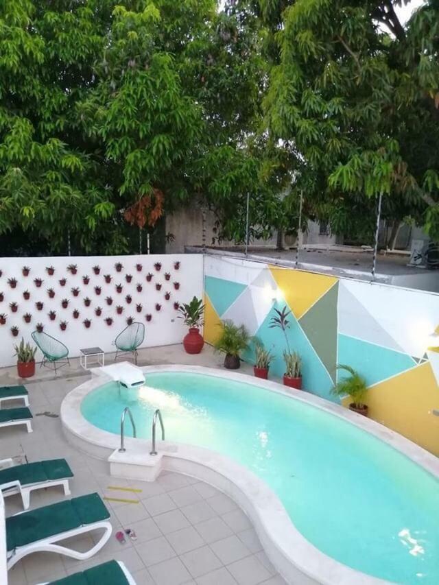 Moloch Hostel&Suites Cancún Exterior foto